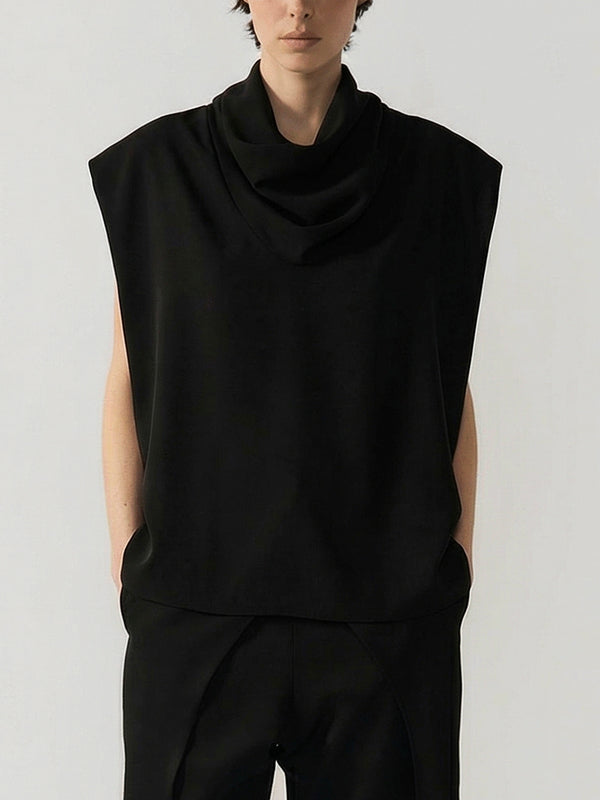 #black Person wearing a black sleeveless top and pants on a white background