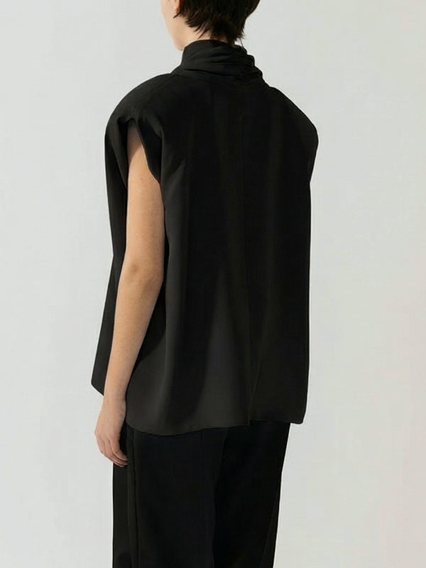 #black Person wearing a black sleeveless top and pants on a white background