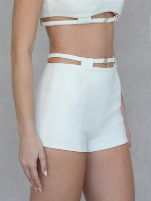 #off-white White high-waisted shorts with cut-out design on a neutral background