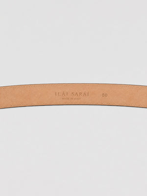 #taupe A close-up of a light tan leather belt strap with debossed branding reading 'ILAI SARAI' and size '80' on a light gray background.